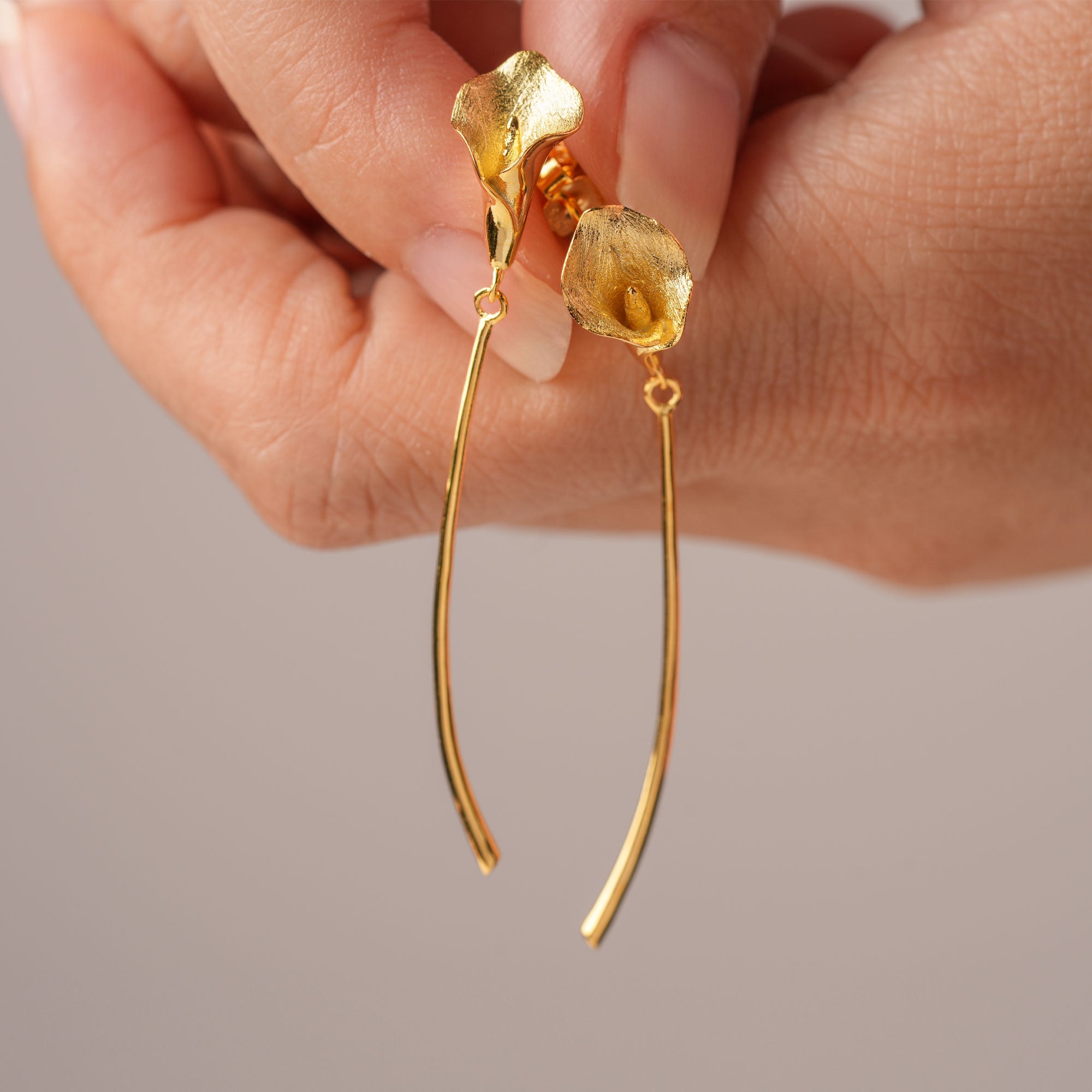 Calla lily drop earrings in silver and gold