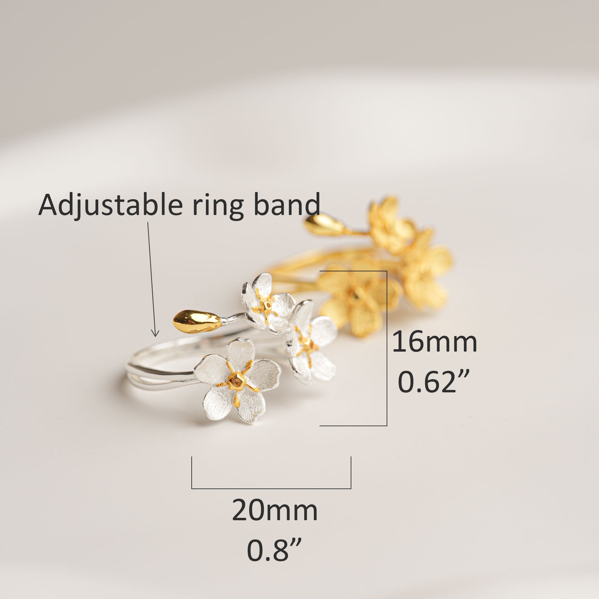 Adjustable flower ring band size detail