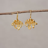 Artisan chrysanthemum gold earrings product view