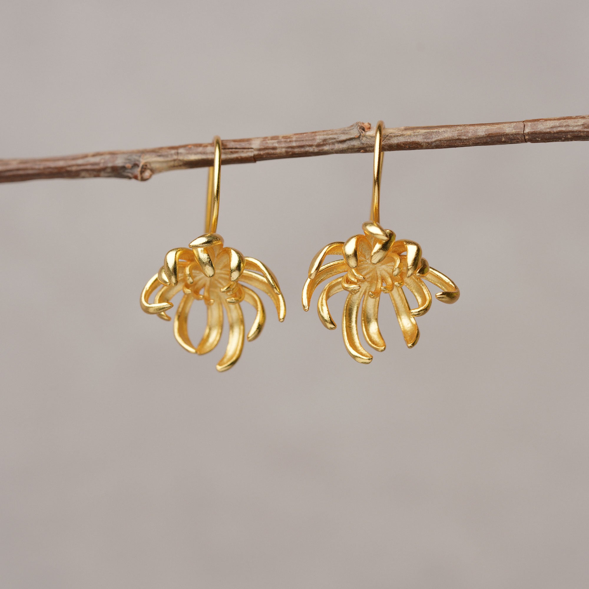 Artisan chrysanthemum gold earrings product view