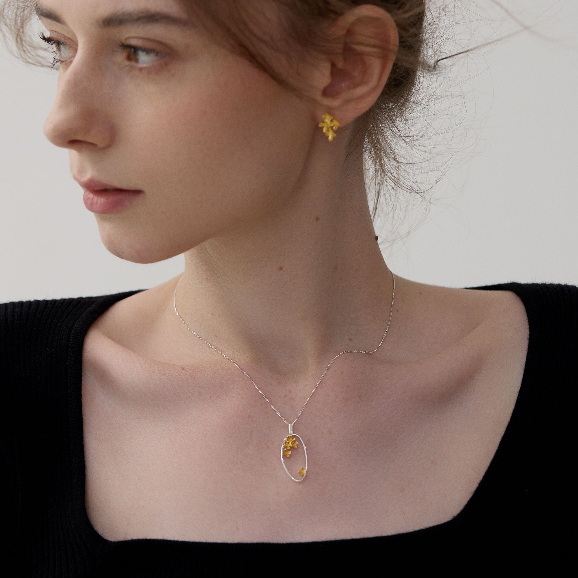 Blooming osmanthus silver necklace close-up