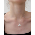 Butterfly orchid jewelry necklace close-up