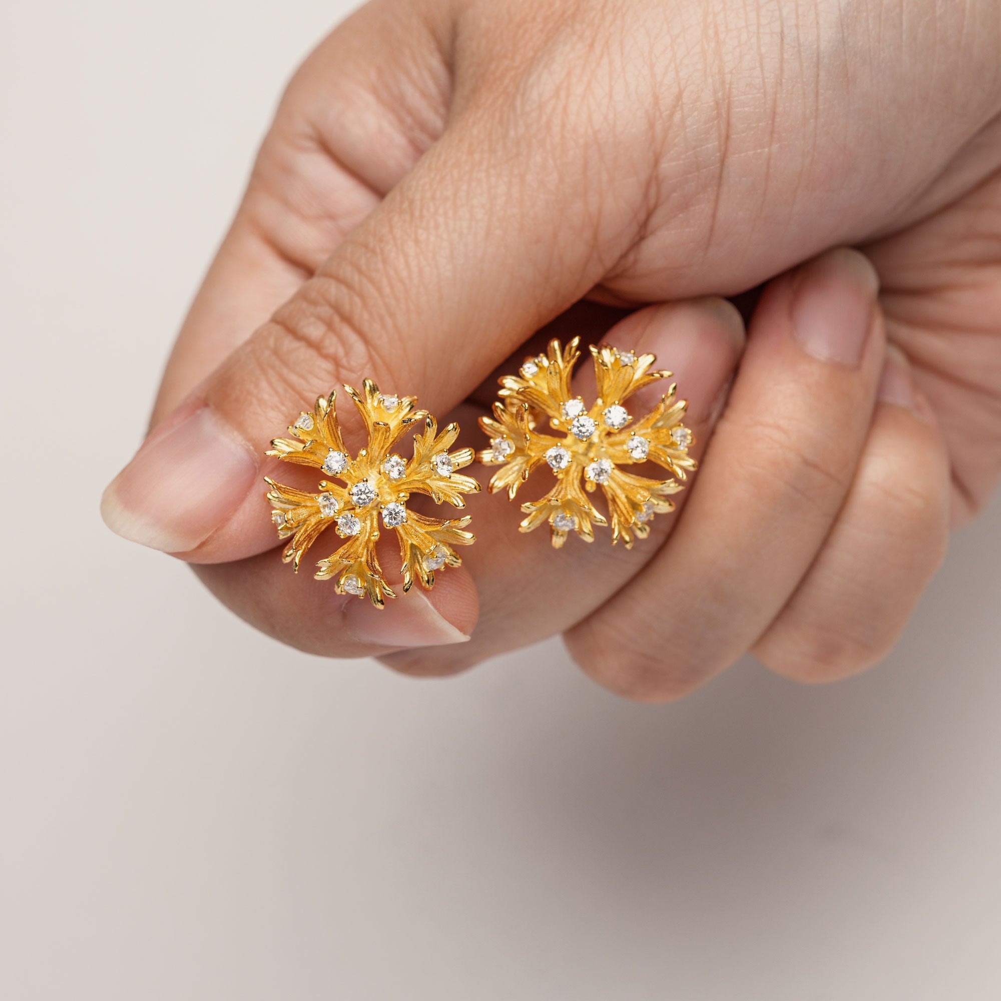 Cornflower bloom stud jewelry close-up