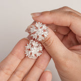 Cornflower bloom studs displayed as a pair