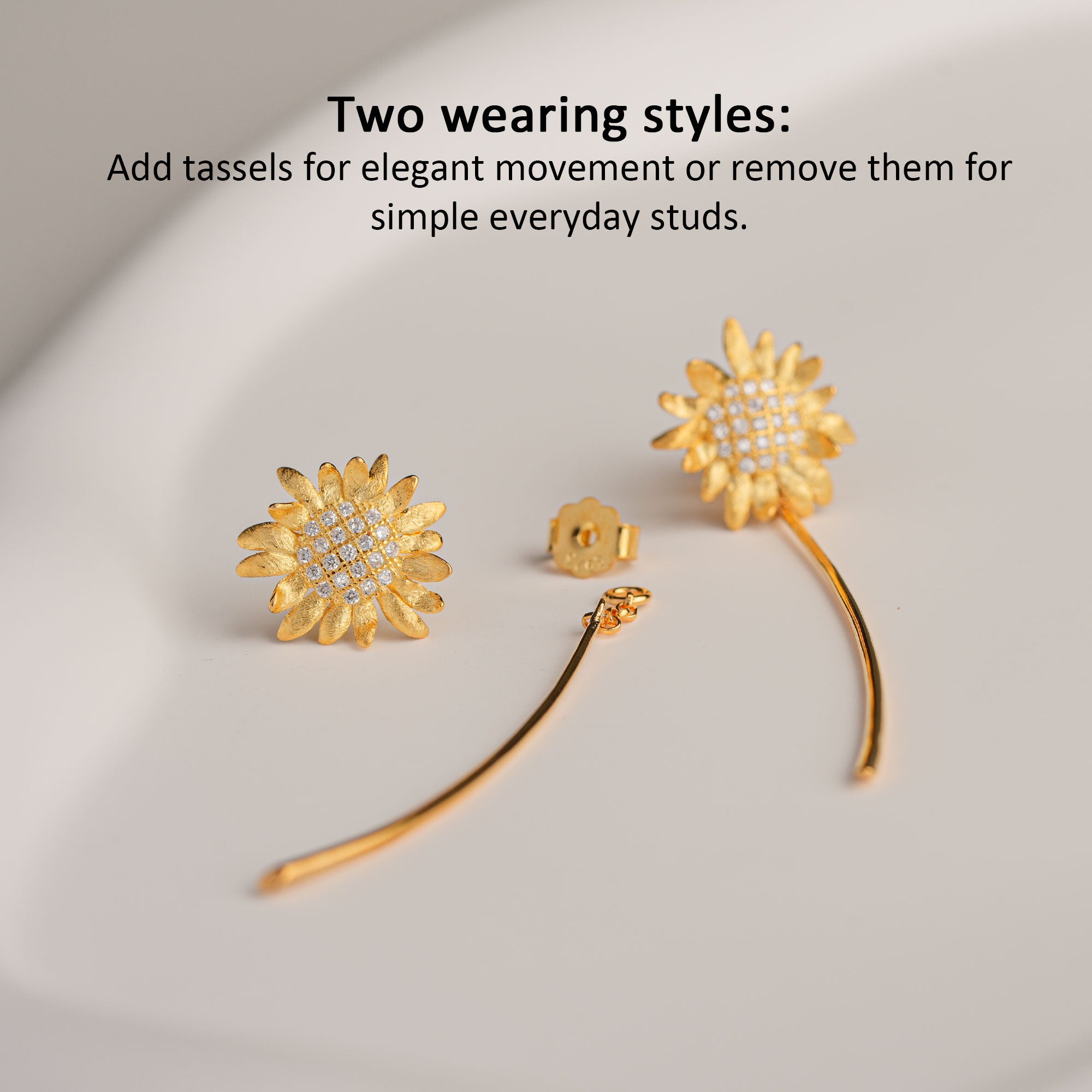 Elegant sunflower tassel earrings displayed as a pair