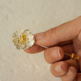 Flower brooch with poppy blossom design