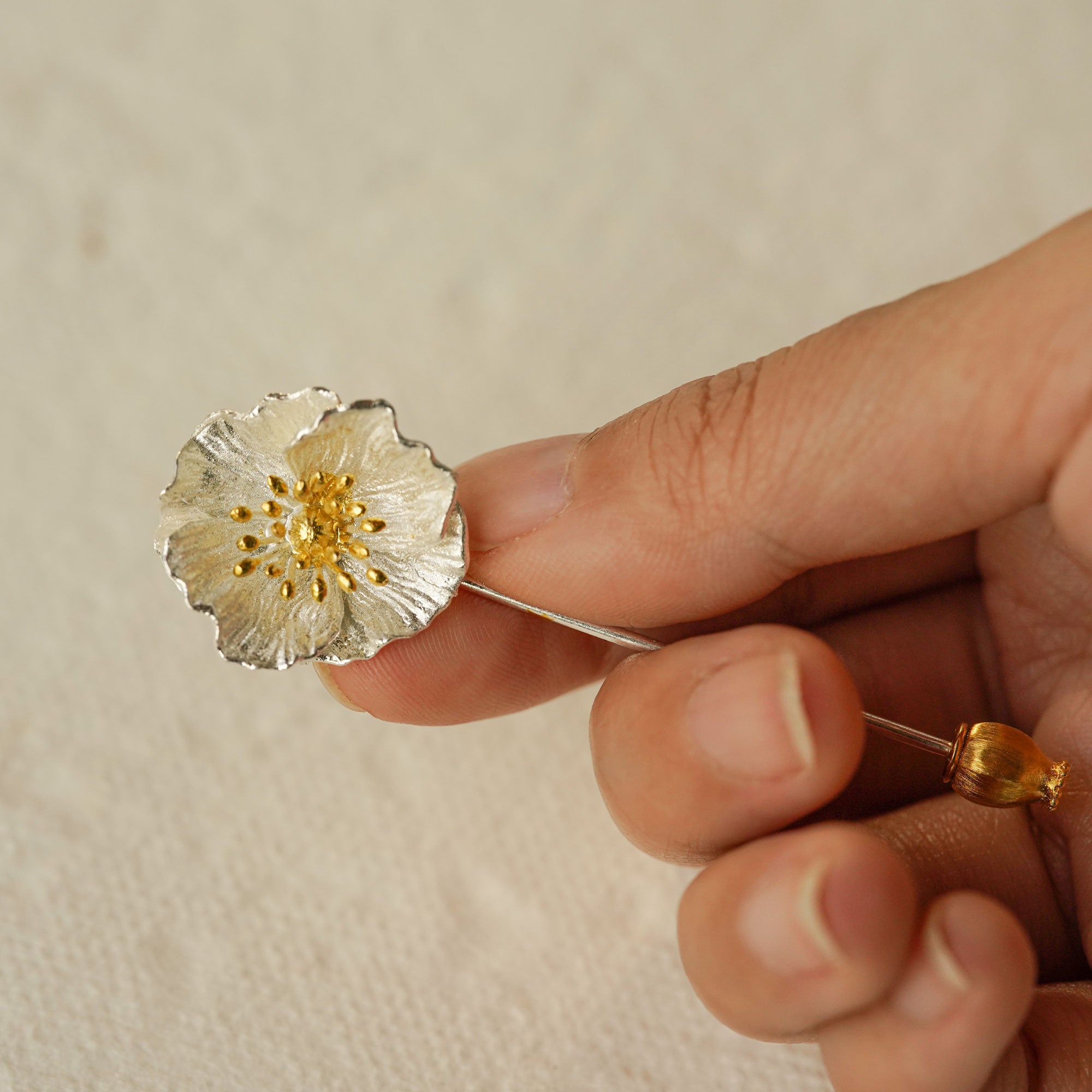 Flower brooch with poppy blossom design