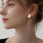 Floral poppy earrings showing flower design