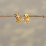 Gold forget-me-not earrings with small flower design