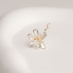 Freesia flower brooch close-up