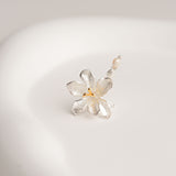 Freesia flower brooch close-up