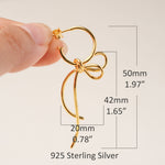 Gold bow earrings