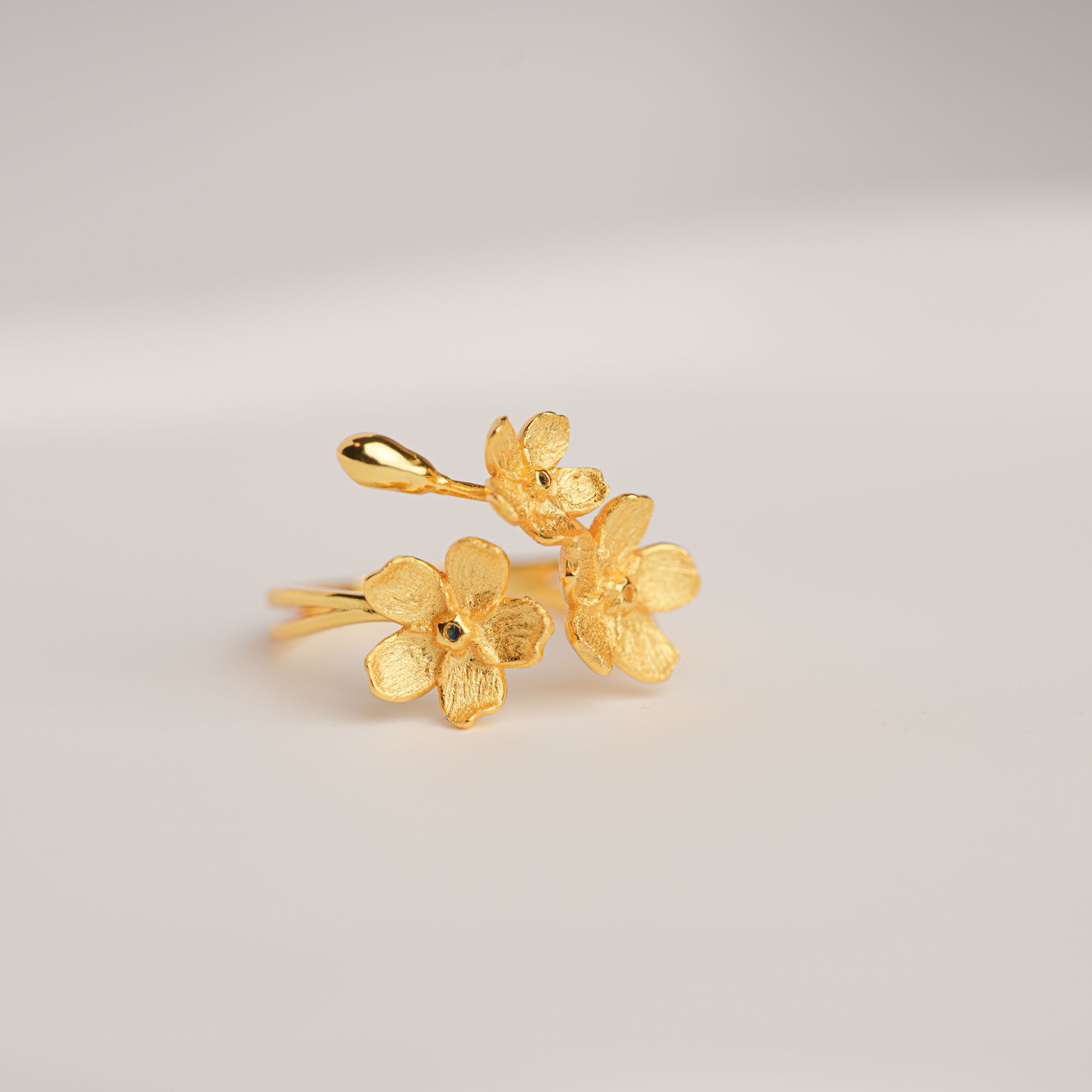 Gold forget-me-not flower ring with floral design