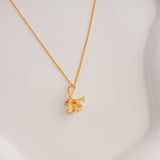 Gold freesia bloom necklace product view