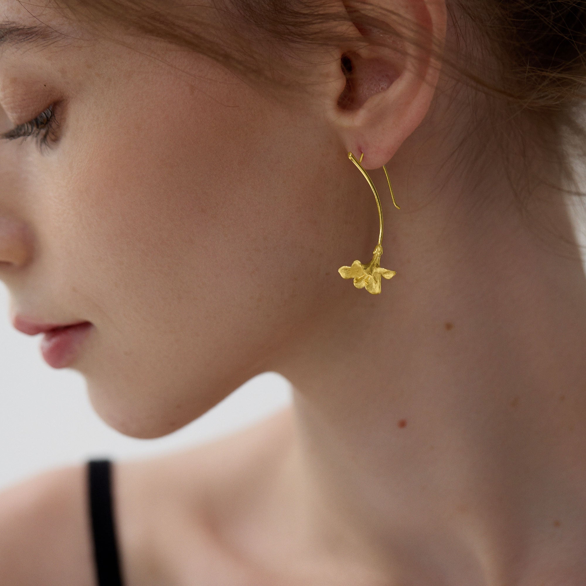 Gold freesia flower earrings product detail view
