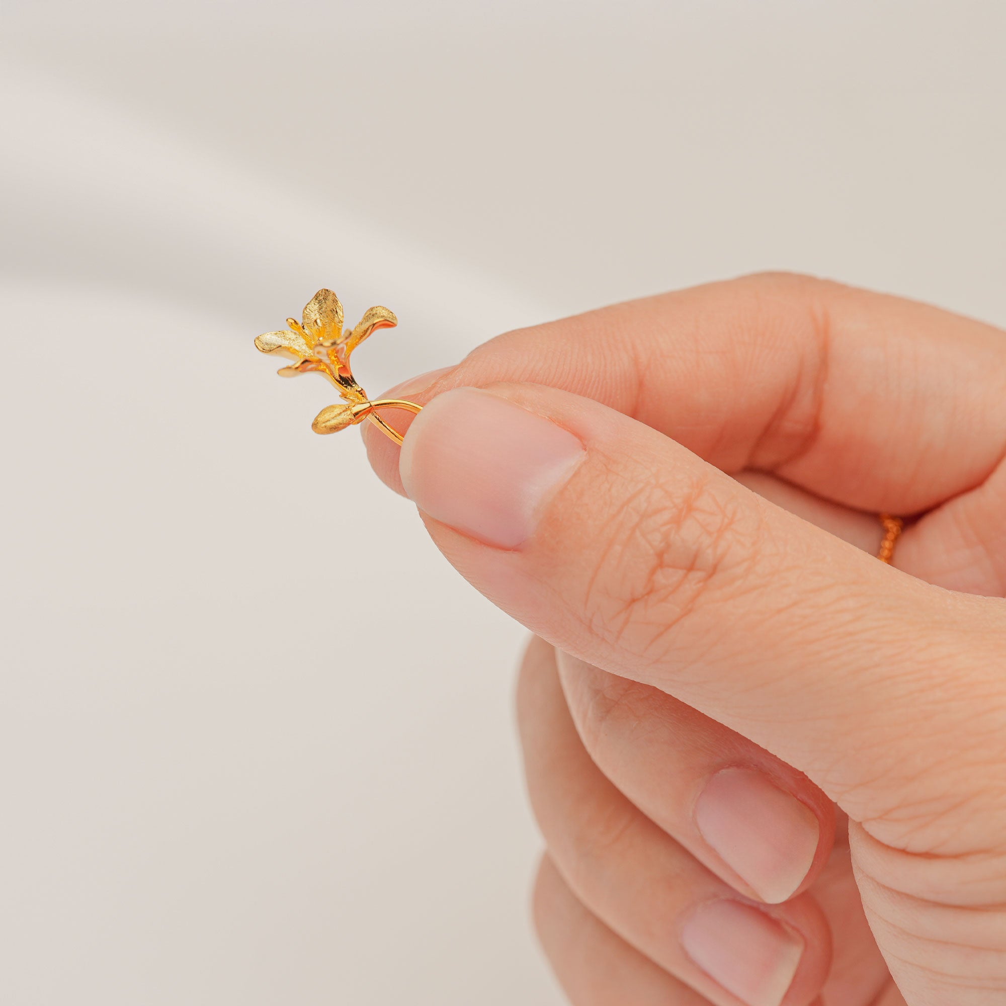 Gold freesia flower pendant