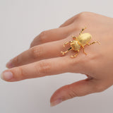 Gold insect brooch product detail view