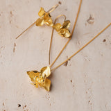 Gold plated orchid pendant necklace product detail