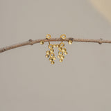 Gold starlight earrings with cascading star details
