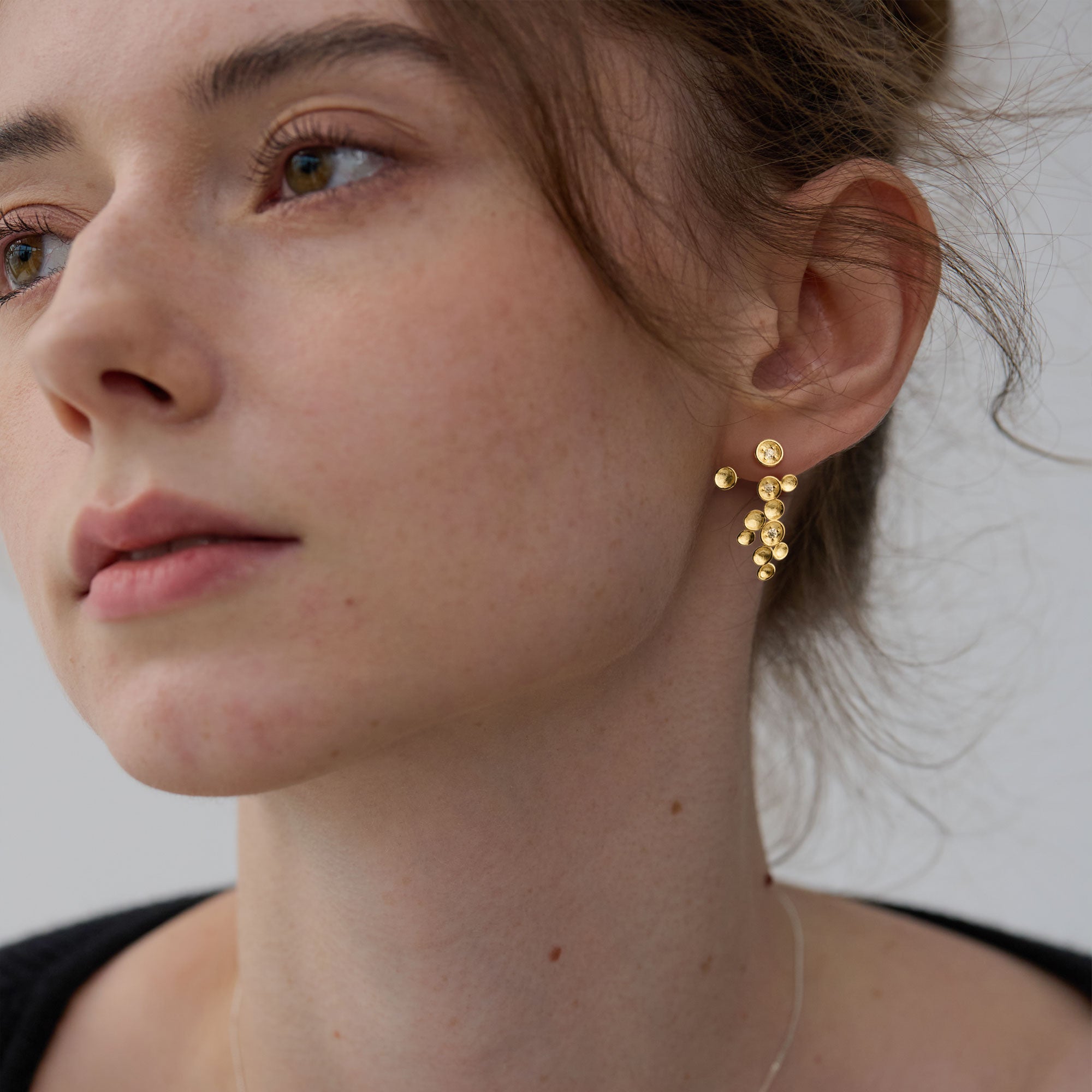Gold starlight earrings product view