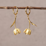 Gold tulip flower hoop earrings