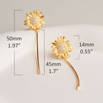 Golden flower earrings shown as sunflower jewelry