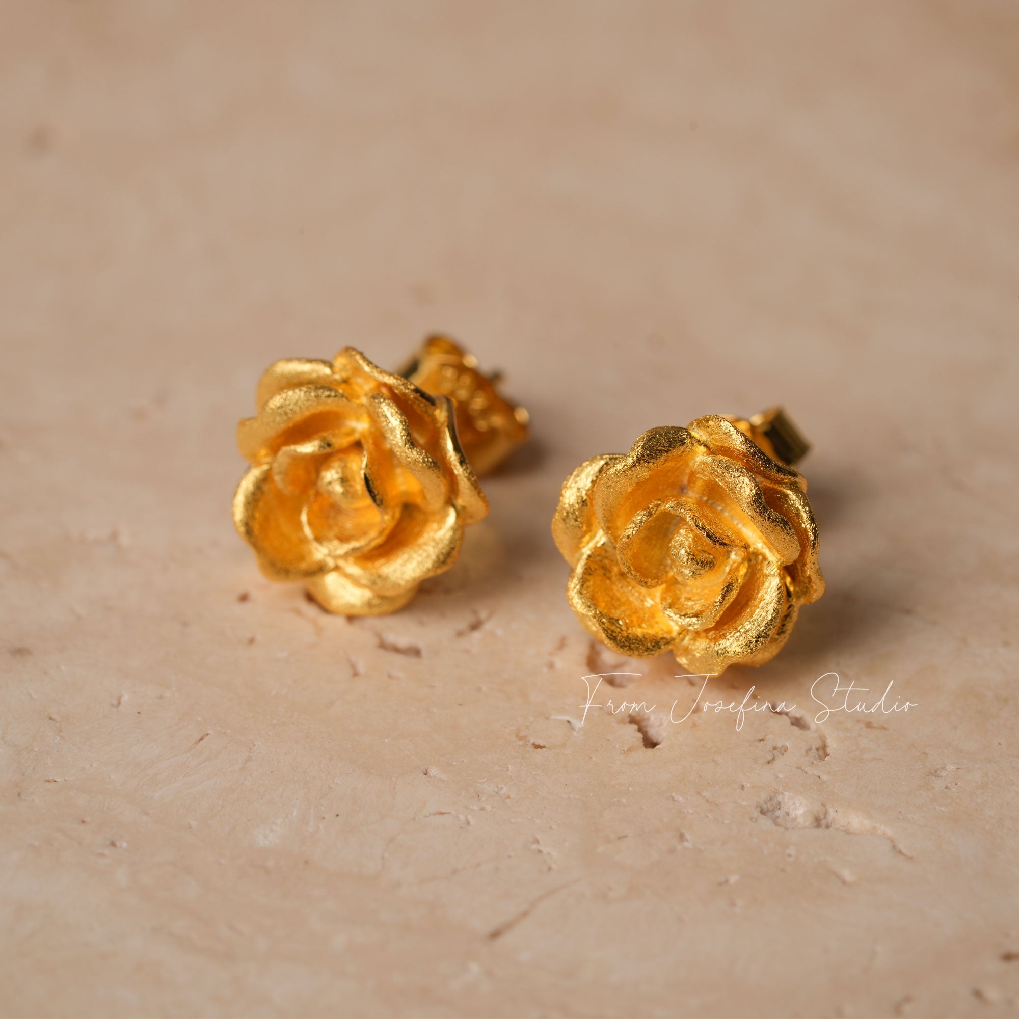 Golden rosebud earrings product detail view