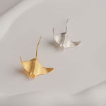 Manta ray brooch with marine conservation theme