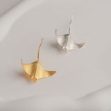 Manta ray brooch with marine conservation theme