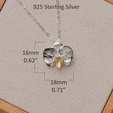 Minimalist flower necklace with orchid pendant