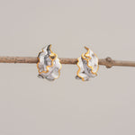 Nature inspired sea grass earrings in sterling silver and gold, sculptural artisan design for calm everyday elegance
