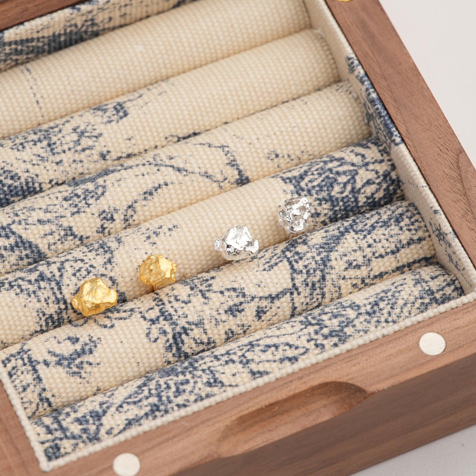 Nugget stud earrings displayed as a pair
