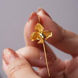 Orchid jewelry gift with floral detail