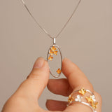 Osmanthus necklace with floral pendant design