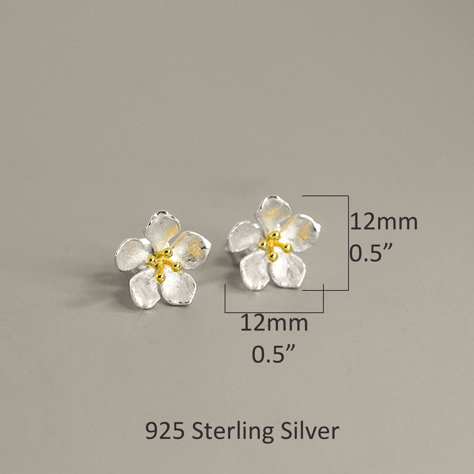 Peach blossom flower earrings displayed as a pair