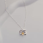 Phalaenopsis orchid necklace close-up