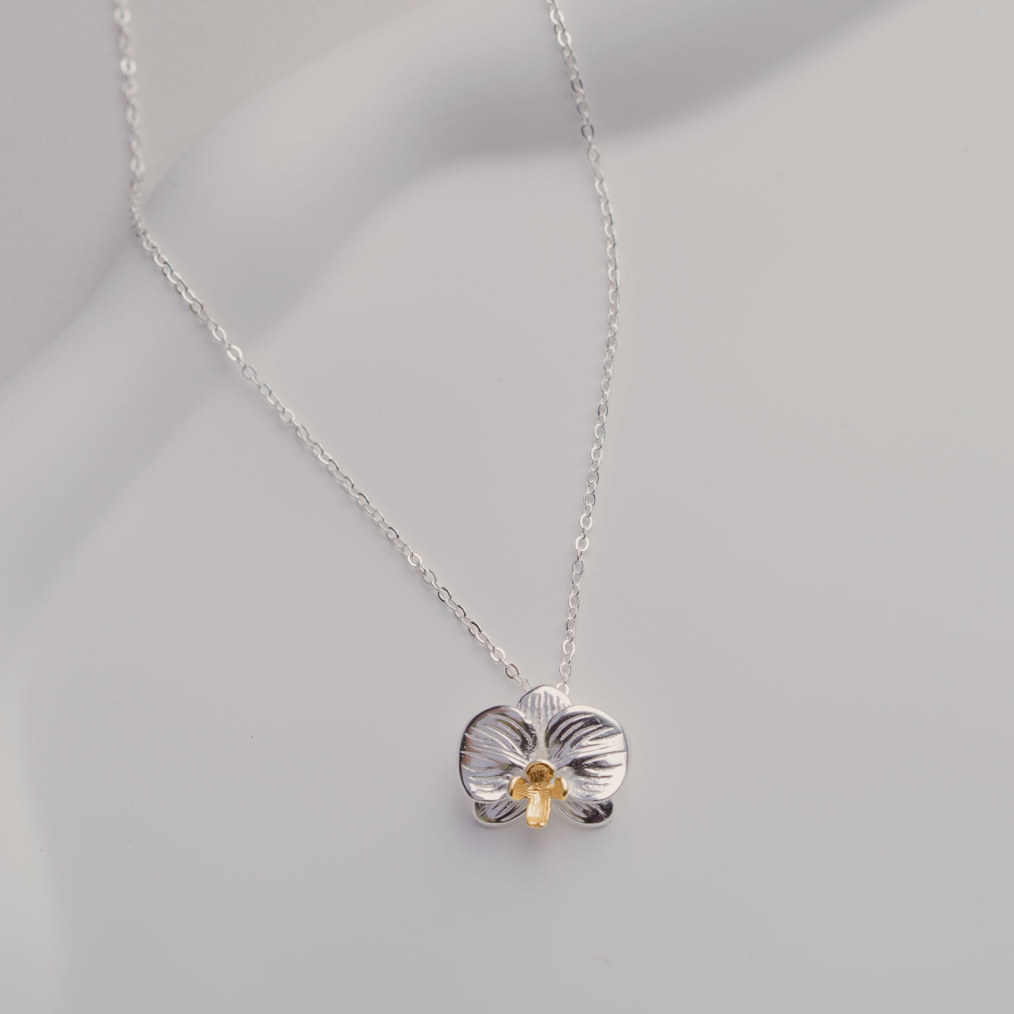 Phalaenopsis orchid necklace close-up