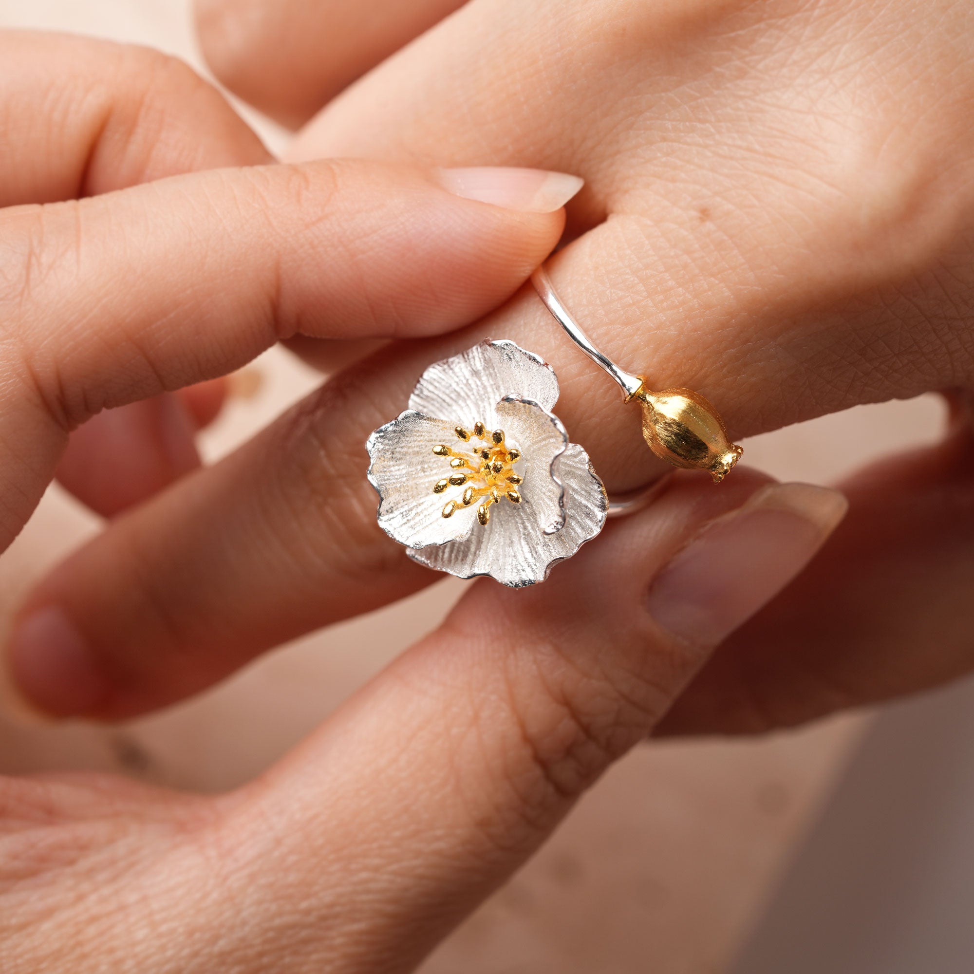 Poppy flower jewelry ring close-up