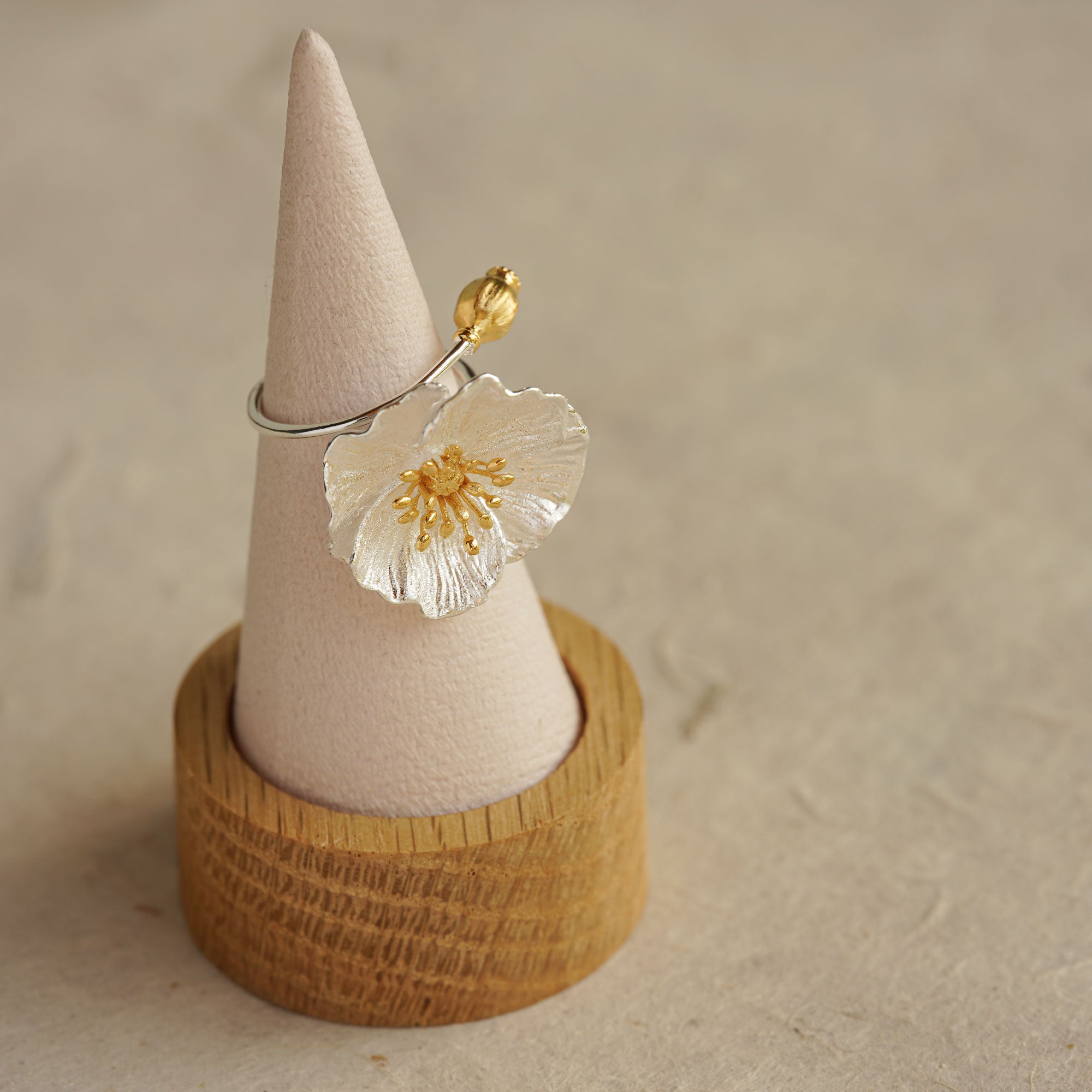 Poppy jewelry ring displayed on neutral background