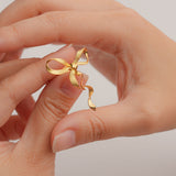 Ribbon earrings with elegant bow design