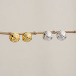Rose dome earrings displayed as a pair