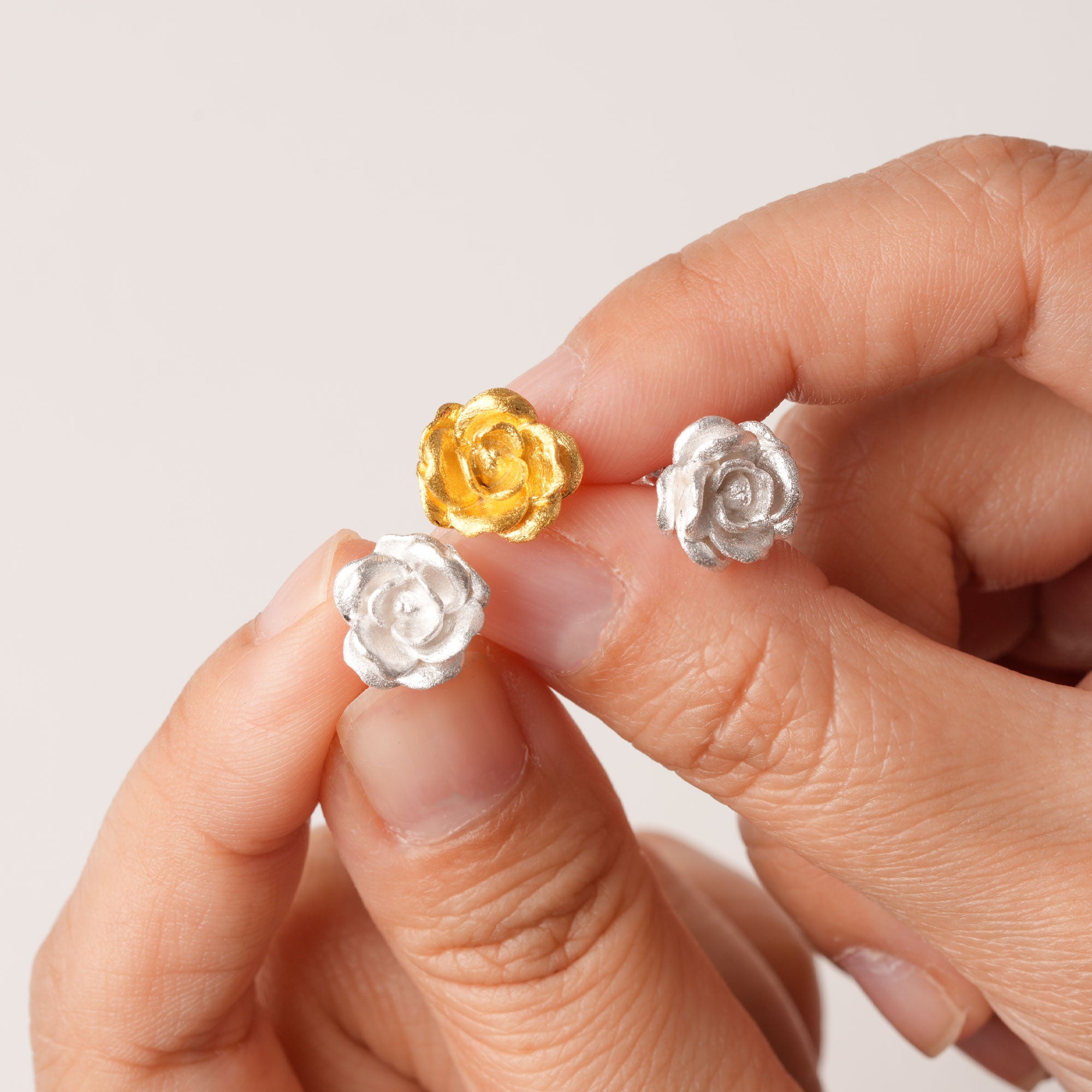 Rosebud stud earrings with spring flower design