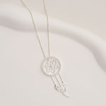 Silver dreamcatcher necklace close-up