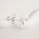 Silver ribbon bow knot earrings