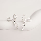 Silver ribbon bow knot earrings