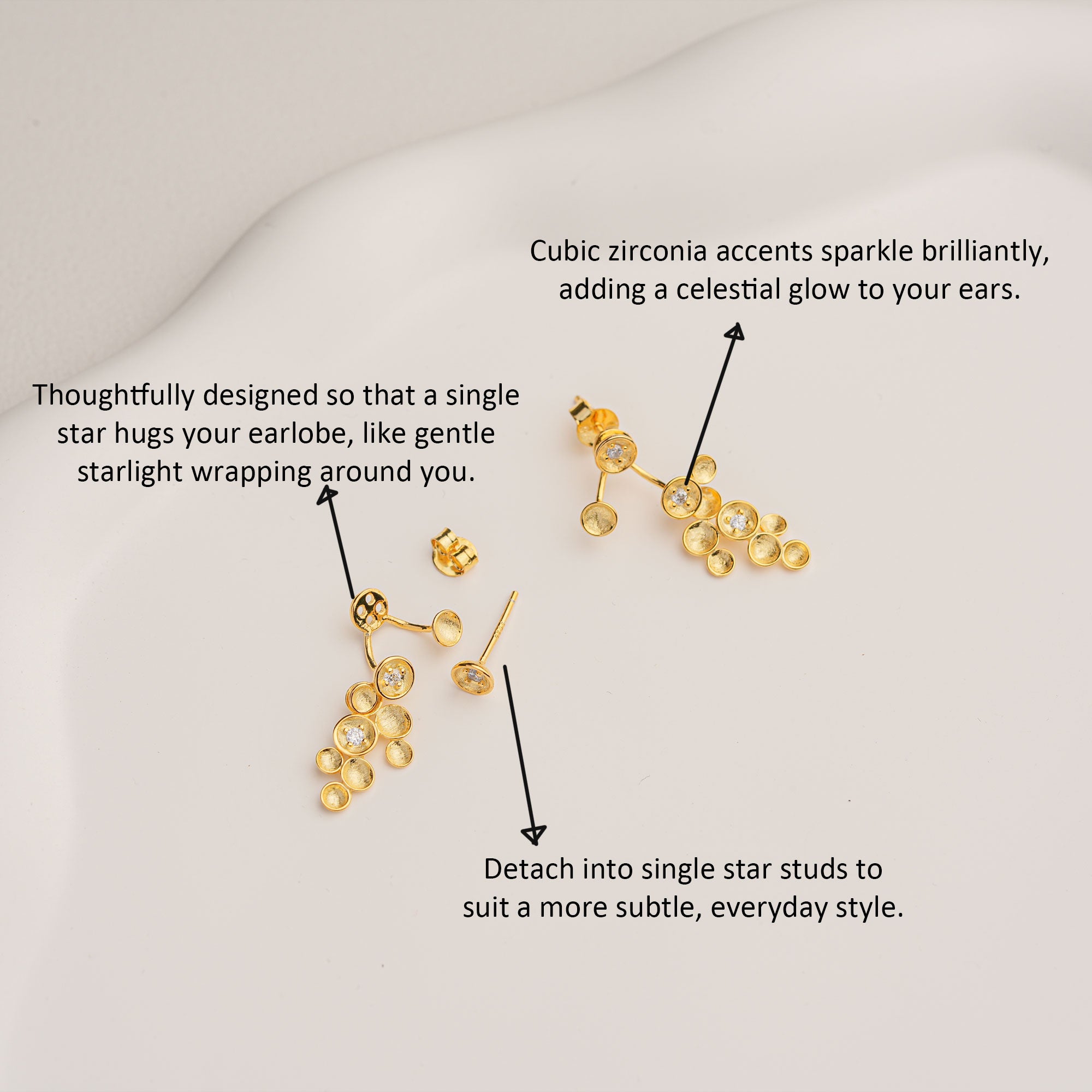 Starlight earrings displayed on neutral background