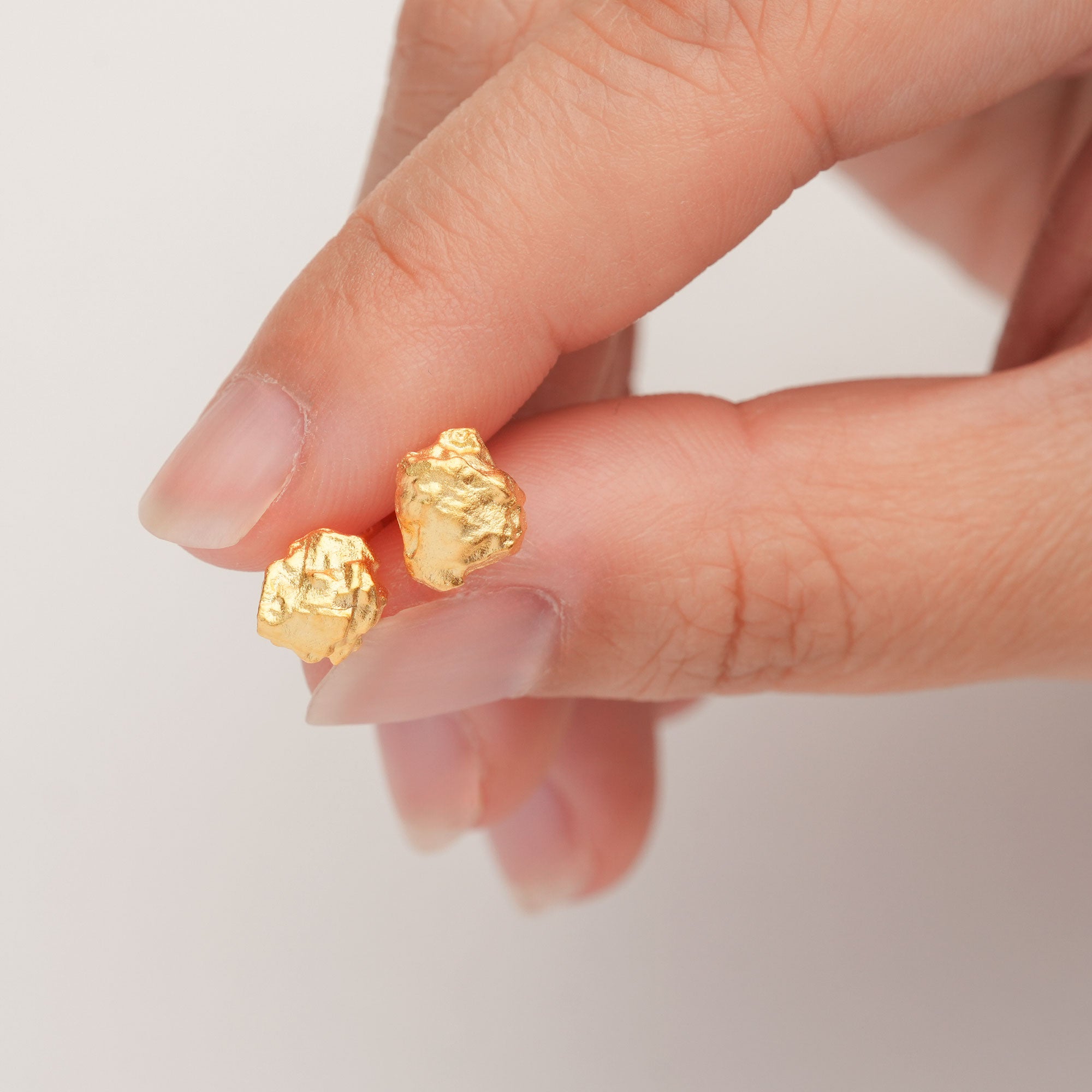 Stone earrings in gold or silver with organic pebble shape
