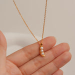 Three peas in a pod necklace