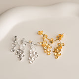 Tiny star earrings close-up