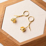 Tulip hoop earrings product detail view